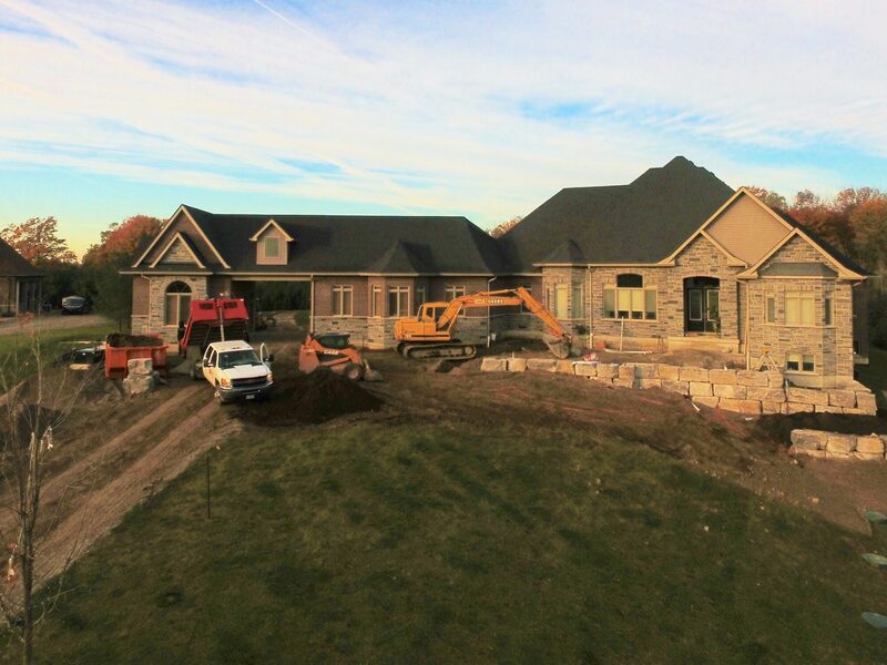 Pro-Land equipment staged on a residential property